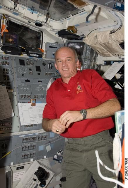 NASA image: Expedition 21 FE-5 Williams poses for a photo on the Atlantis Flight Deck