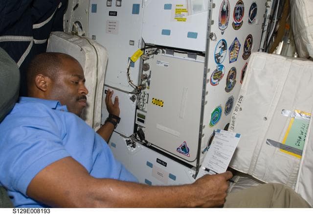NASA image: MS1 Melvin works with the GLACIER on the Middeck