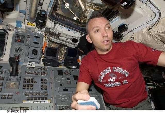 NASA image: STS-129 MS2 Bresnik works on the Flight Deck