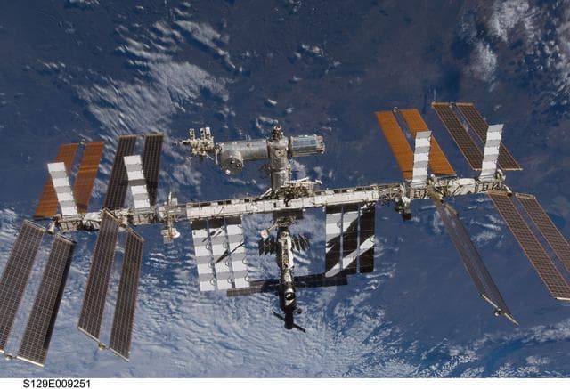 NASA image: Overall view of the ISS taken as Atlantis departs at the end of the STS-129 Mission
