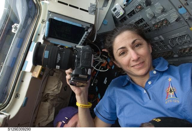 NASA image: View of MS Stott posing for a photo on the Atlantis Flight Deck