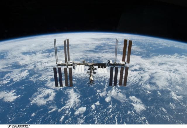 NASA image: Overall view of the ISS taken as Atlantis departs at the end of the STS-129 Mission