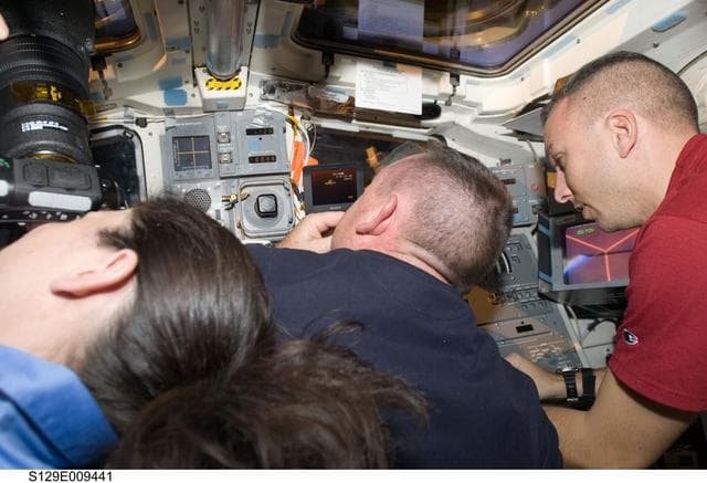 NASA image: View of STS-129 Crew Members on the Atlantis Flight Deck