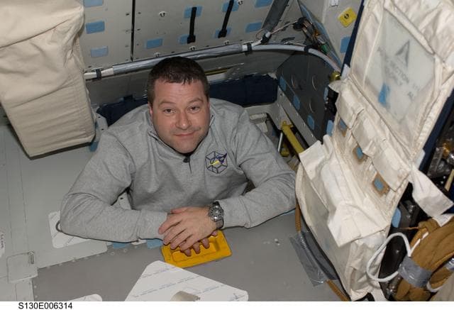 NASA image: Patrick in Interdeck Access Hatch