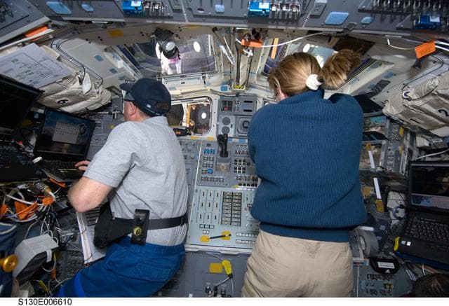 NASA image: Robinson and Hire on Aft FD