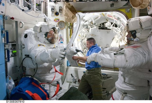 NASA image: Crewmembers in A/L prior to EVA 2