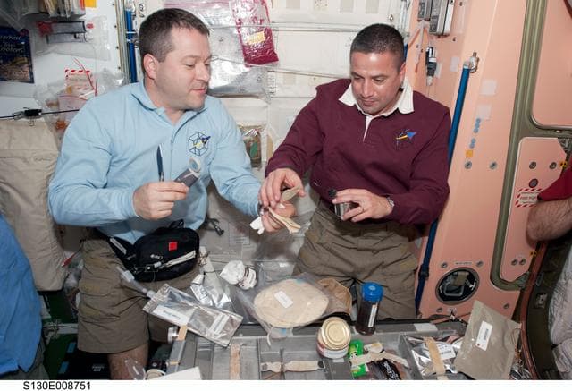 NASA image: Crewmembers Share a Meal in Node 1