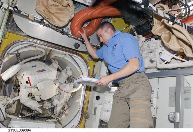 NASA image: Zamka with EV Crewmembers in A/L prior to EVA 3