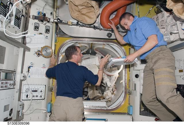 NASA image: Crewmembers in A/L prior to EVA 3