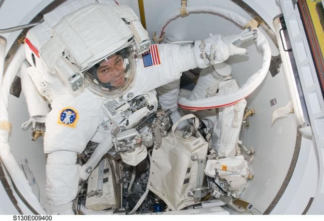 NASA image: Behnken and Patrick in Crew Lock prior to EVA 3