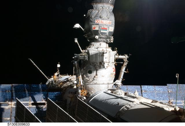 NASA image: View of DC1 Through Cupola Window