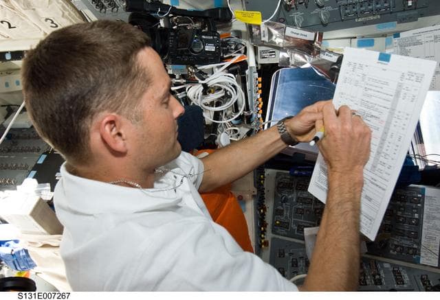 NASA image: Dutton on the Flight Deck during Approach OPS