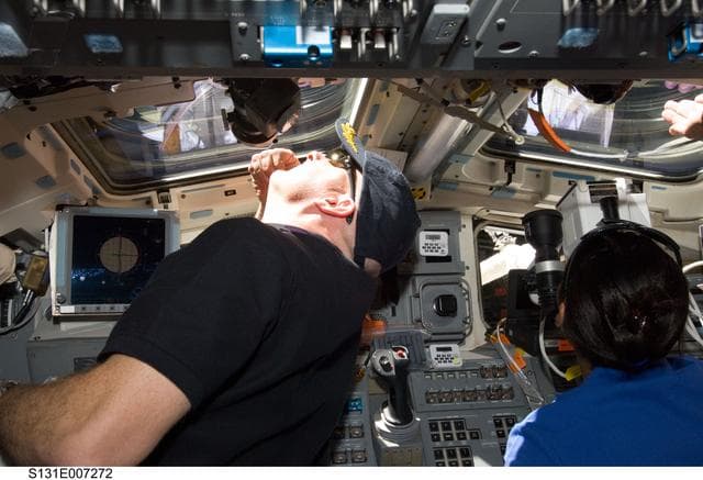 NASA image: Poindexter and Wilson on the Flight Deck during Approach OPS