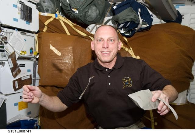 NASA image: Anderson eats on MDDK