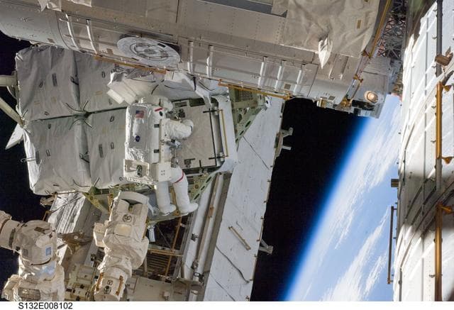 NASA image: Bowen works electric batteries during EVA 1