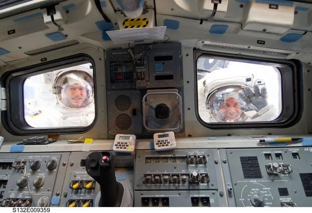 NASA image: Good and Reisman outside the aft FD windows during STS-132 EVA-3