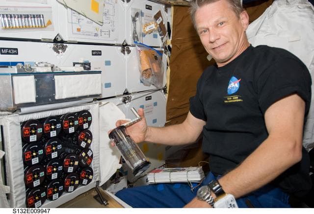 NASA image: Sellers works with GAP during Joint Operations