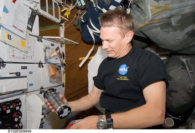 NASA image: Sellers works with GAP during Joint Operations