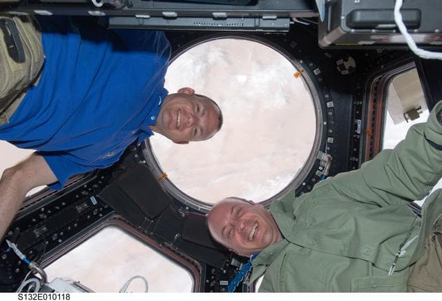 NASA image: Antonelli and Reisman in the Cupola during Joint Operations