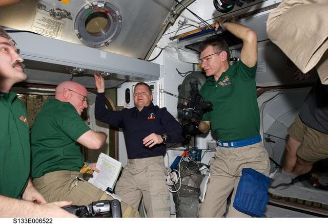 NASA image: STS-133 and Expedition 26 crew in Node 2