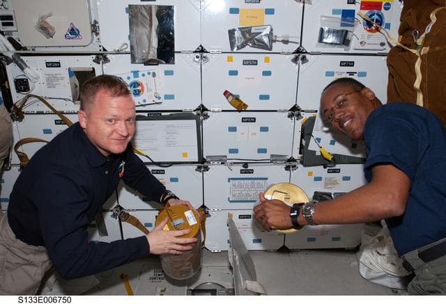 NASA image: Boe and Drew perform LiOH changeout