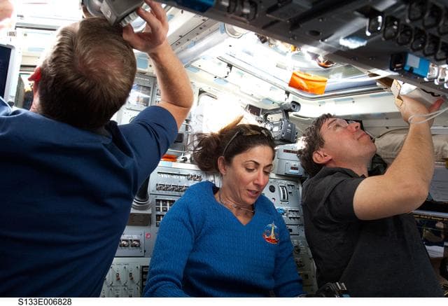 NASA image: STS-133 crewmembers on aft flight deck