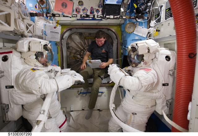 NASA image: STS-133 crewmembers in Airlock