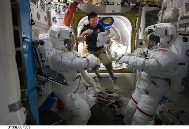 NASA image: STS-133 crewmembers  in Airlock