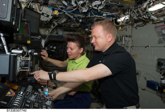 NASA image: Boe and Coleman at SSRMS controls in U.S. Laboratory