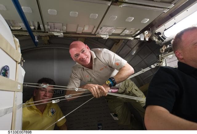 NASA image: STS-133 and Expedition 26 crew enter PMM (Permanent Multipurpose Module)