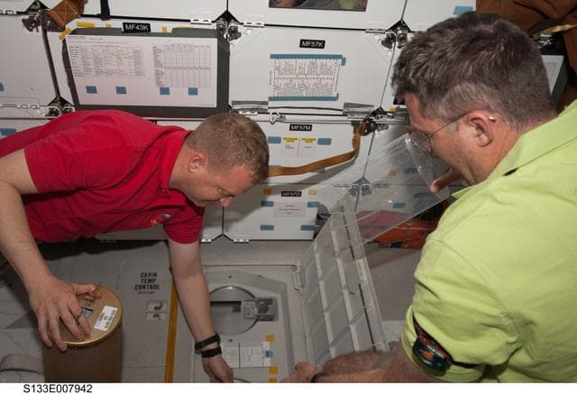 NASA image: Boe and Bowen on Middeck with LiOH canisters