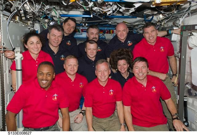 NASA image: STS-133 / Expedition 26 on-orbit crew portrait