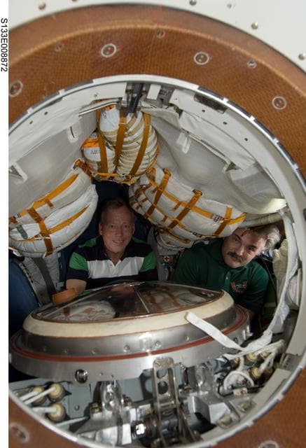 NASA image: Lindsey and Kaleri in Soyuz