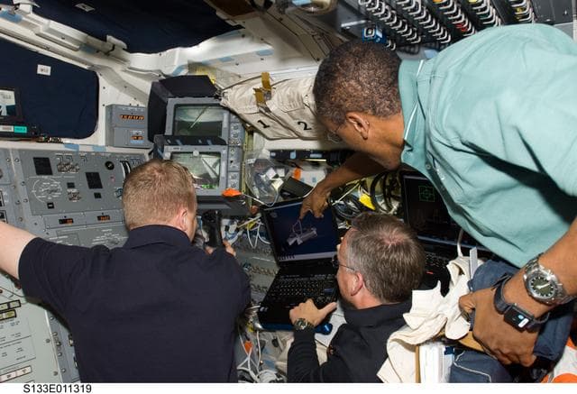 NASA image: Boe,Lindsey and Drew on aft flight deck