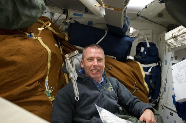 NASA image: View of STS-134 MS Feustel on the Shuttle Middeck