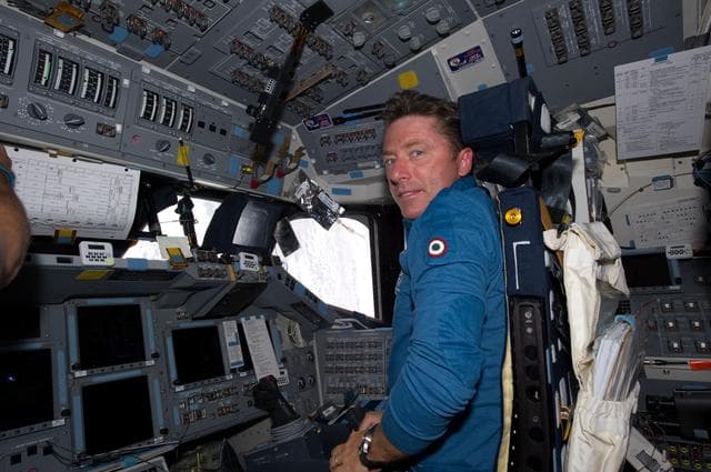 NASA image: View of STS-134 MS Vittori working on the Flight Deck