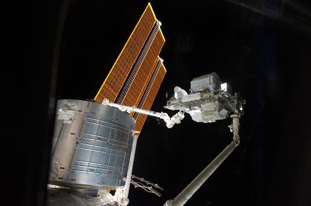 NASA image: View of ELC3 handoff from SRMS to SSRMS