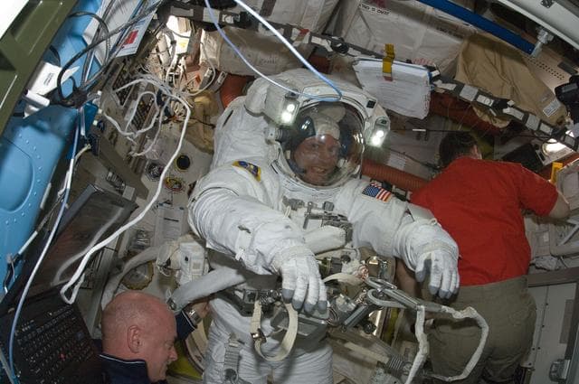 NASA image: STS-134 MS Fincke in the Airlock at the end of EVA-3