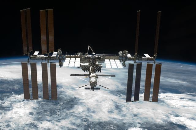 NASA image: Overall view of ISS taken afer STS-134 Undocking