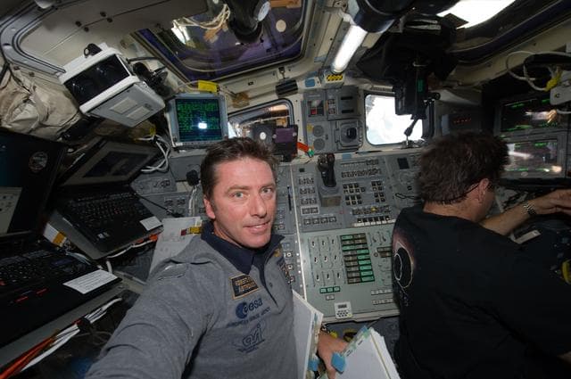 NASA image: STS-134 Crew Members work on the Flight Deck