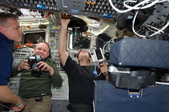 NASA image: STS-134 Crew Members working on the Flight Deck