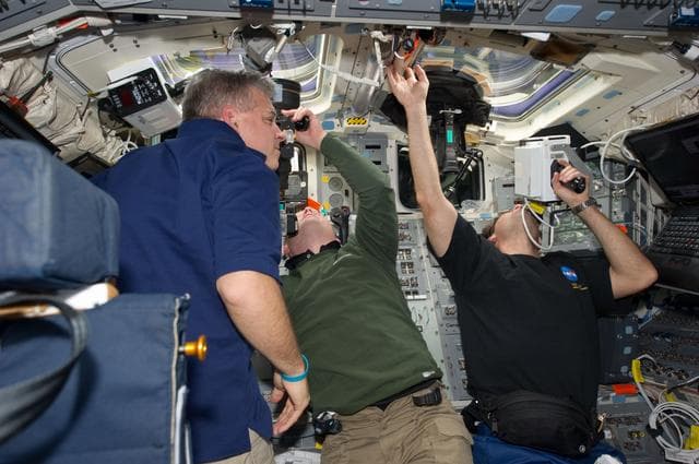 NASA image: STS-134 Crew Members working on the Flight Deck