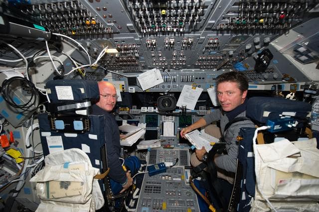 NASA image: STS-134 Crew Members working on the Flight Deck