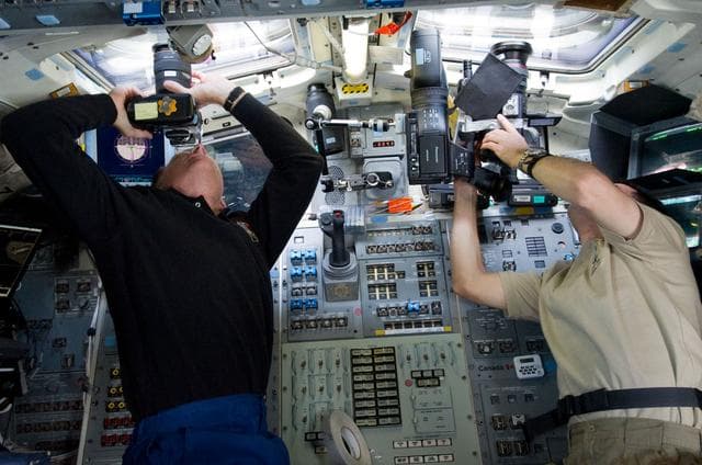 NASA image: Ferguson and Walheim on Atlantis Aft Flight Deck during Rendezvous OPS