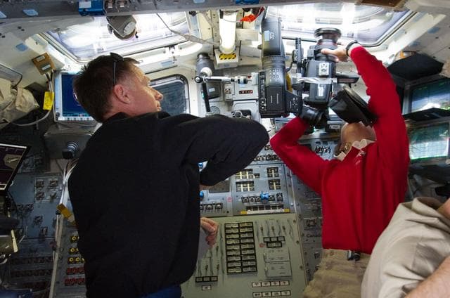 NASA image: Ferguson and Magnus on Atlantis Aft Flight Deck during Rendezvous OPS