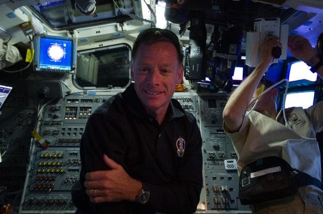 NASA image: Ferguson on Atlantis Aft Flight Deck during Rendezvous OPS