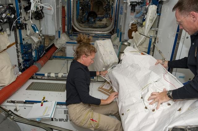 NASA image: Magnus and Ferguson Configure Raffaello for Ingress