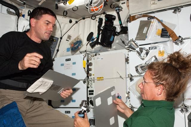 NASA image: Walheim and Magnus on Atlantis Middeck