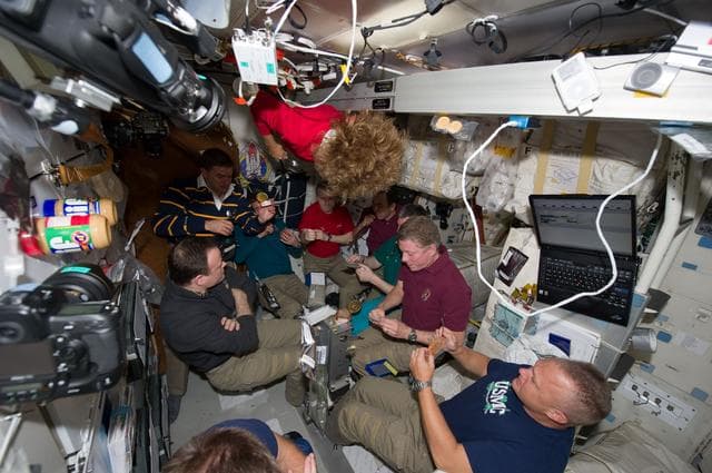 NASA image: Crewmembers share All-American Meal on Atlantis Middeck