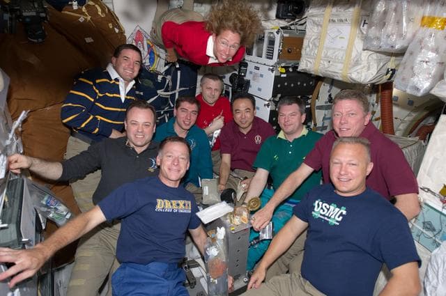 NASA image: Crewmembers share All-American Meal on Atlantis Middeck